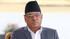Newly elected Nepalese Prime Minister Pushpa Kamal Dahal, also known as Prachanda, (L) sits on a chair upon his arrival to administers the oath of office at the presidential building "Shital Niwas" in Kathmandu, Nepal, August 4, 2016. REUTERS/Navesh Chitrakar